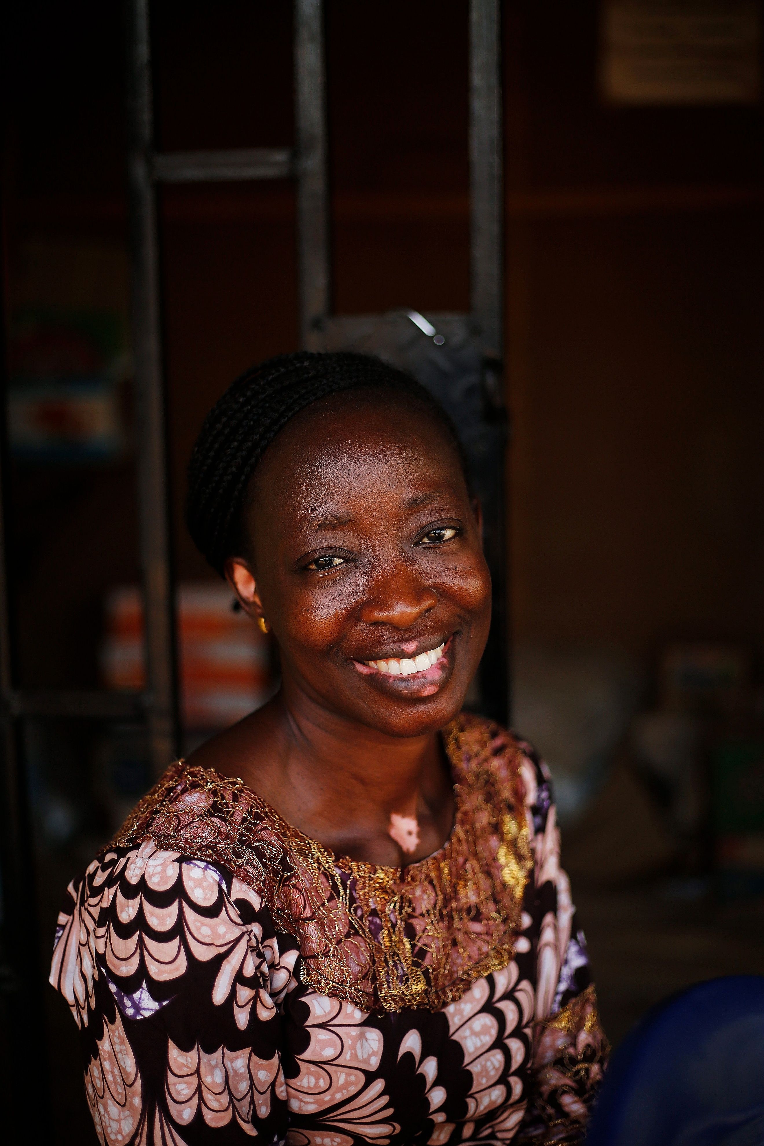 Smiling woman photographed in Abuja, Nigeria